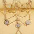 Lunelle gold floral toe ring anklet for women with multi-layer chain tassel details and metallic foot jewelry design